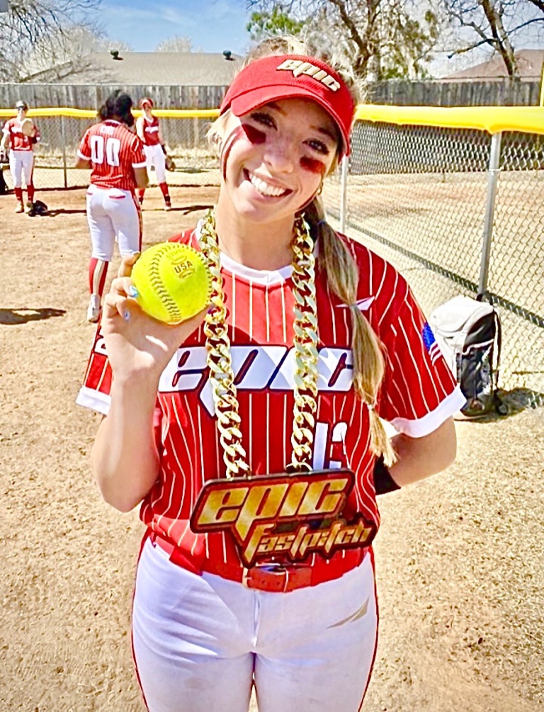 Softball player wearing a custom celebration chain